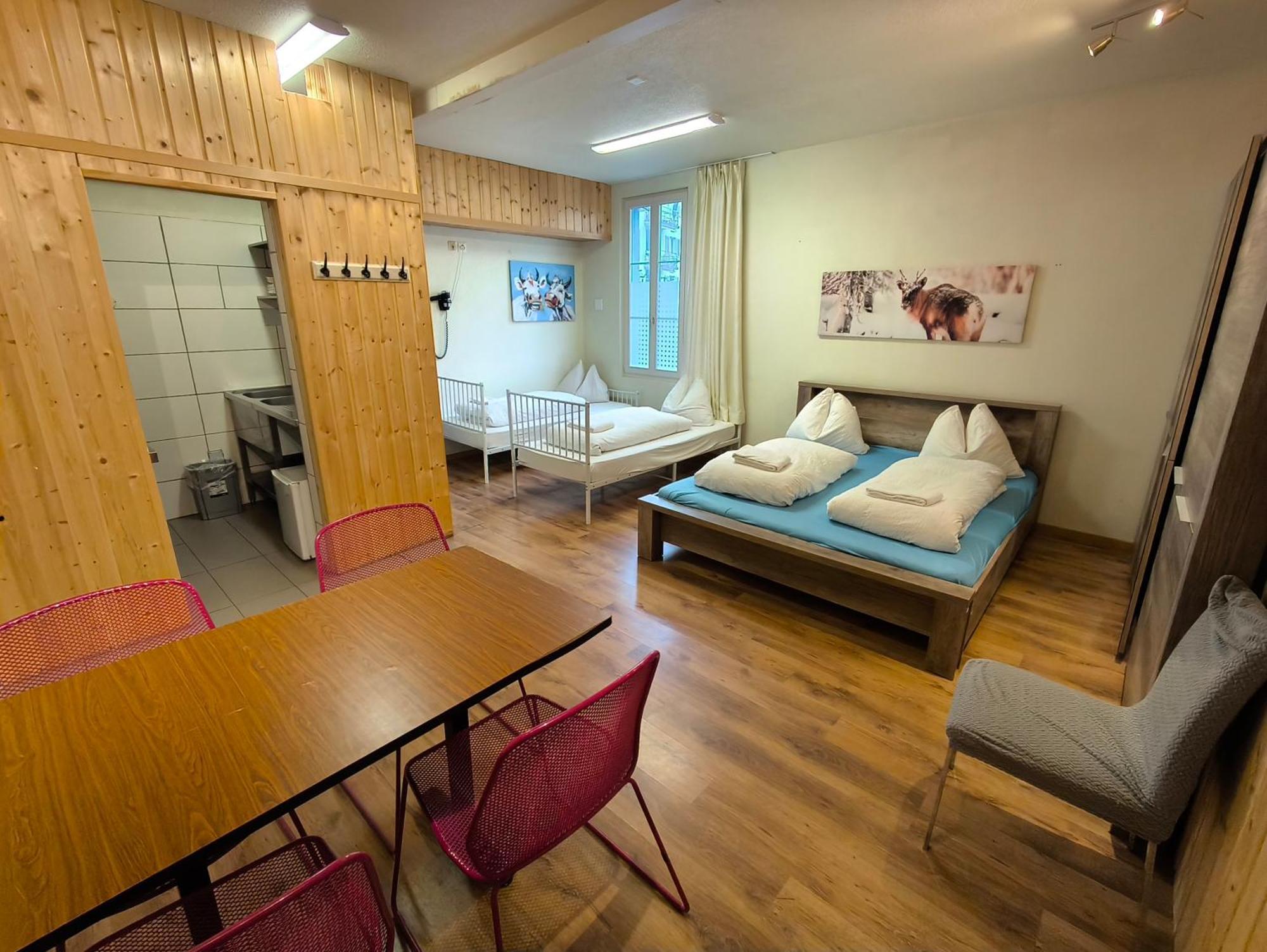 Interlaken Linda Inn Lodge Rom bilde